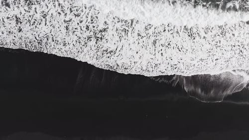 The Black Sand Beach in Iceland Sea Aerial View and Top View