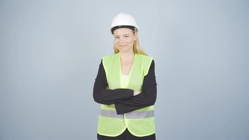Engineer making a sign of confidence at the camera.