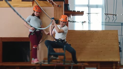 A Little Boy of 10 Years Old Goes Through an Obstacle Course in a Rope Park