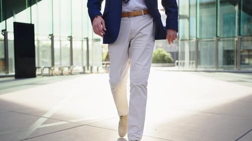 Professional Man Buttons Up His Suit Jacket