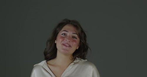 Smiling Woman Laughing and Looking Upward