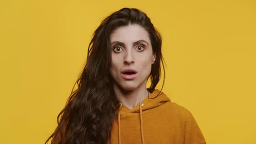 Surprised Woman with Long Dark Hair