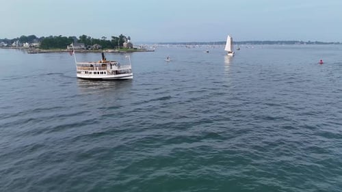 Aerial view of boats near lighthouse, United States.