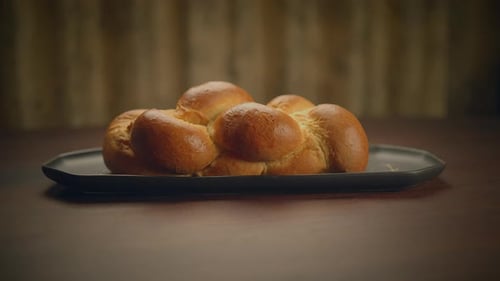 Close Up of Braided Challah Bread on Tray