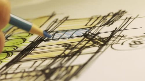 Architect Engineer Sketching Blueprint with Pencil on Paper in Studio Office - Extreme Close Up (4K