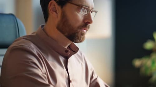 Bearded Businessman Typing Laptop in Office Closeup Focused Manager Working