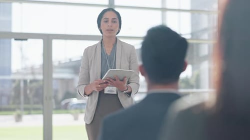Presentation, seminar and woman speaker on tablet talk to audience for conference