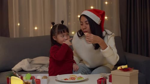 Asian family merry xmas and happy new year holiday. Mom and daughter spend activity enjoy beautiful.