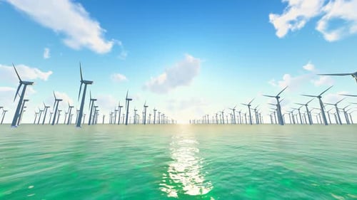 Offshore Wind Farm Turbines Spinning in Ocean at Sunset