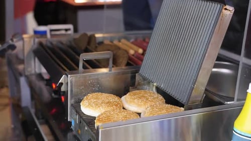 Burger Buns Toasting on Grill