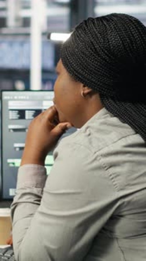 Vertical Video Data Center Staff Member in Office Using AI Deep Learning Algorithms