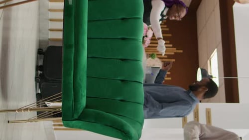 Hotel Lobby with Staff Serving Customers