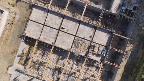 Aerial View Active Construction Work Machines and Workers Building Together