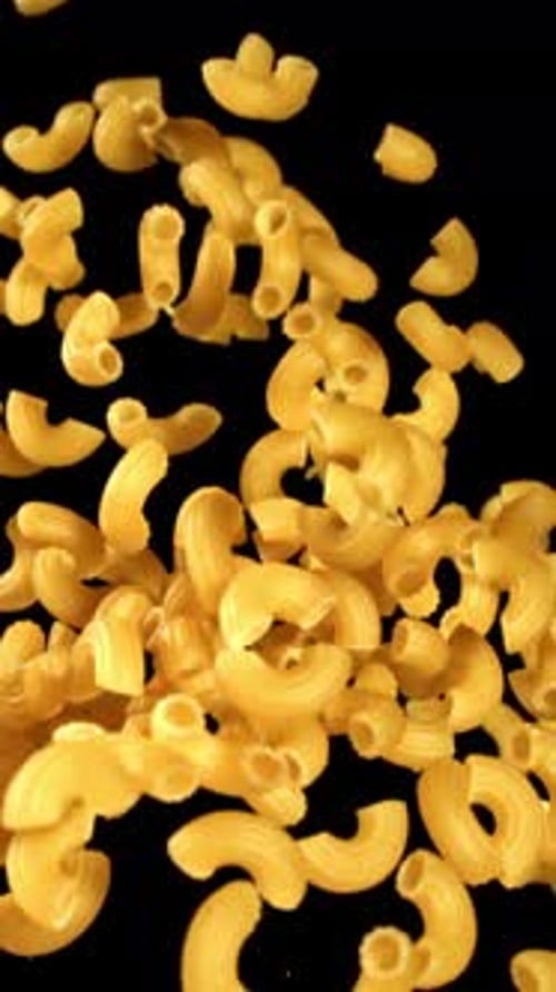 Super Slow Motion Flying Dry Macaroni Pasta Filmed on a Highspeed Camera at 1000 Fps