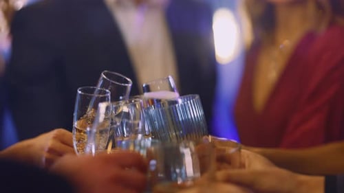 Close Up of People Toasting Drinks at Event