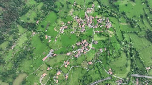 Aerial view of village surrounded by fields, Spain.
