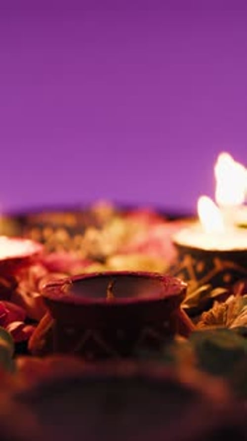 Diwali Celebration: Lighting Clay Oil Lamps with Match