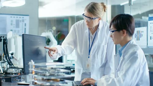 Scientists collaborate in a bright research laboratory