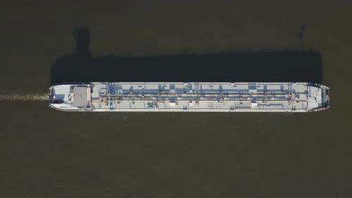 Transporting crude oil across waterways with efficient tanker vessels