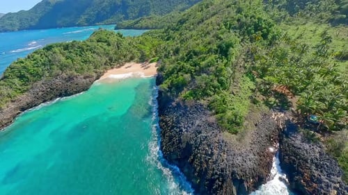 The natural beauty of Playa Onda beach, Samana, Dominican Republic - drone fpv shot