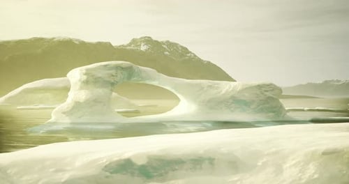 Moving Iceberg with Arctic Landscape and Mountains