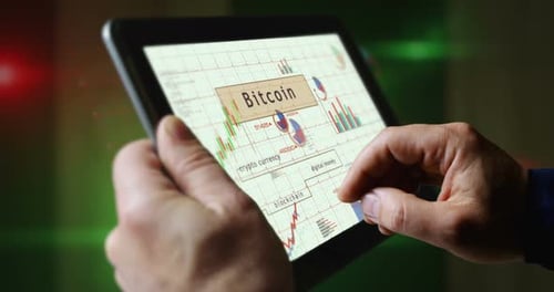 Bitcoin charts graphs on touchscreen pad display