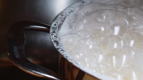 Water Boiling Vigorously in a Pan