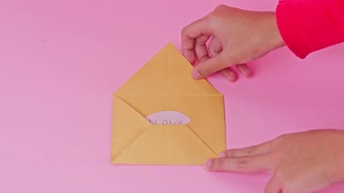 Yellow Envelope and Card with I Love Mom Message