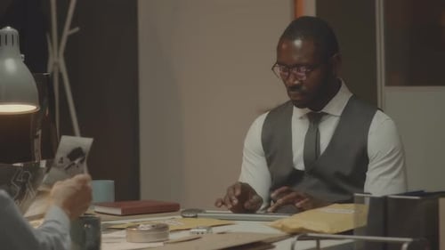 Police Detectives Investigating Murder Case in Office