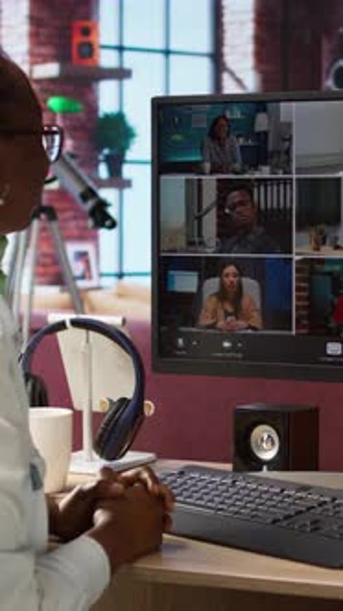 Vertical Video Remote Employee in Home Office Saluting Colleagues During Online Videocall