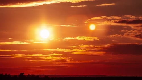 Dramatic Sunset Time Lapse with Moody Clouds