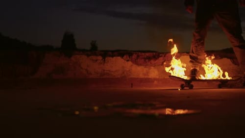 Skateboard on Fire at Night