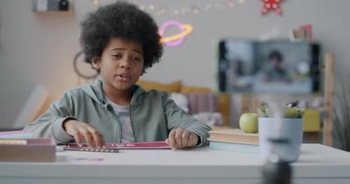 Creative African American Child Recording Video for Online Vlog Speaking Showing Like and Subscribe