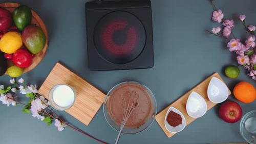 Turning on the Stove and Pouring Milk Into the Pan