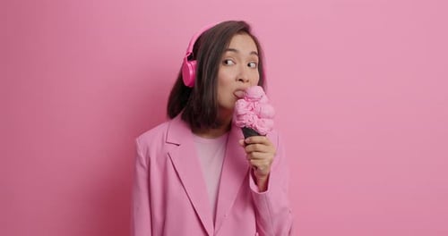 Woman in Pink Reacting to Very Cold Ice Cream