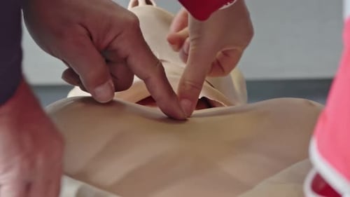 CPR Technique Demonstration on Training Mannequin