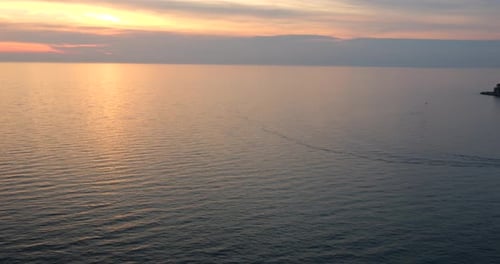Panoramic view of the evening sky, the Adriatic Sea, port of Piran and Croatia coastline