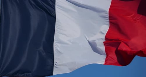 French Flag Waving Proudly in the Wind