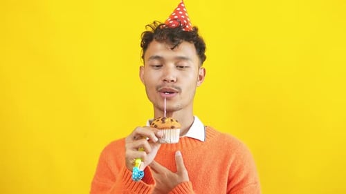 Happy Asian Man Celebrating Birthday