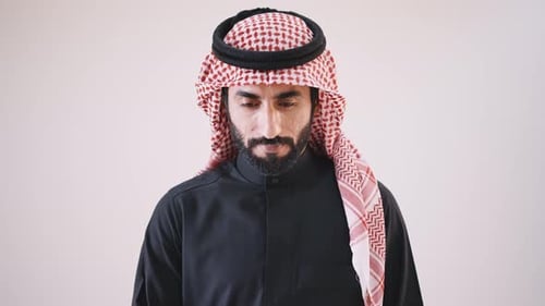 Handsome man with saudi arabia dish dasha