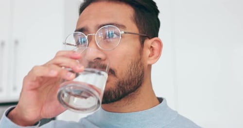 Man Drinking Water Indoors Thirst Quenching Hydration