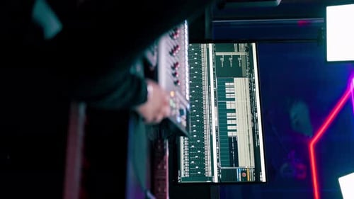 Vertical Video Close Up in the Recording Room Dark with Neon Lighting in the Studio the Sound