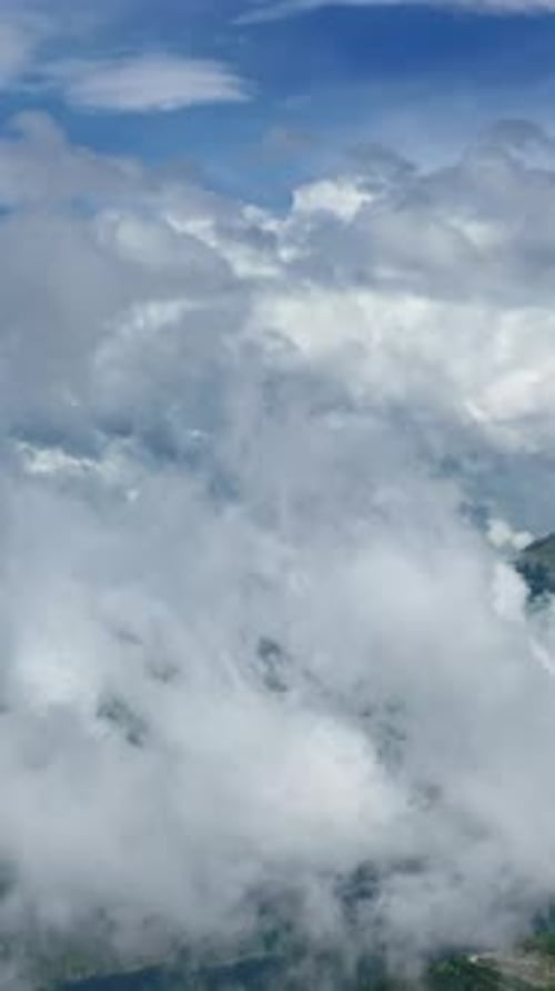 Cloudy Mountain Range Aerial View