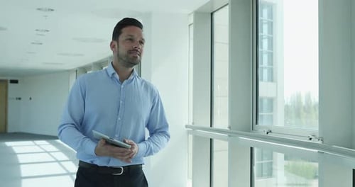 Businesswoman shaking hands with businessman