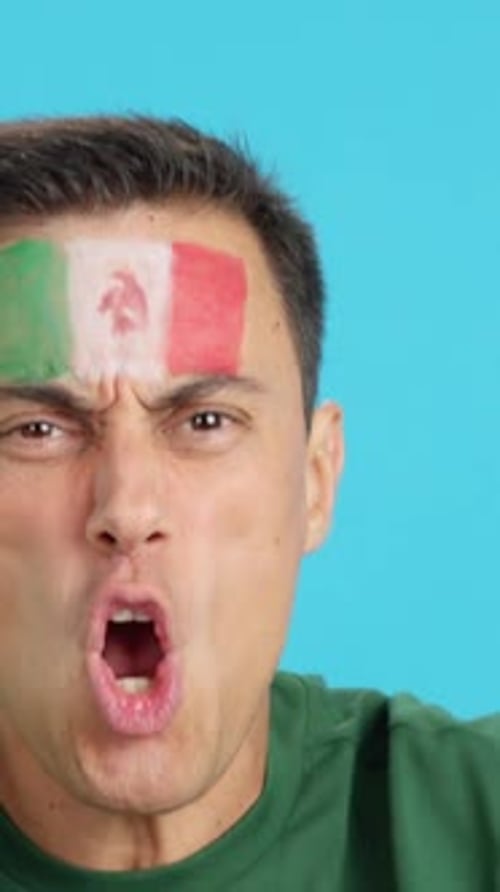 Close Up of a Man Supporting Mexican Team