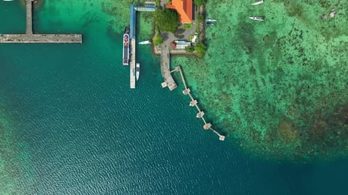 Aerial view of ferry harbour and boats, Indonesia.