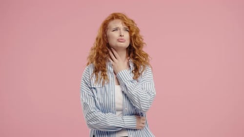 Young Woman Experiencing Sore Throat and Discomfort