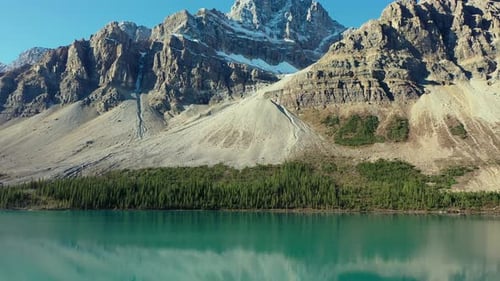 Crowfoot Mountain in autumn with snow as seen from Bow Lake.