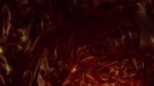 Glitter Paint Flow and Floating Ink Shape an Abstract Art Background in Yellow and Orange