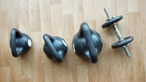Gym Equipment or Dumbbell Kettlebell in a Gym Bench